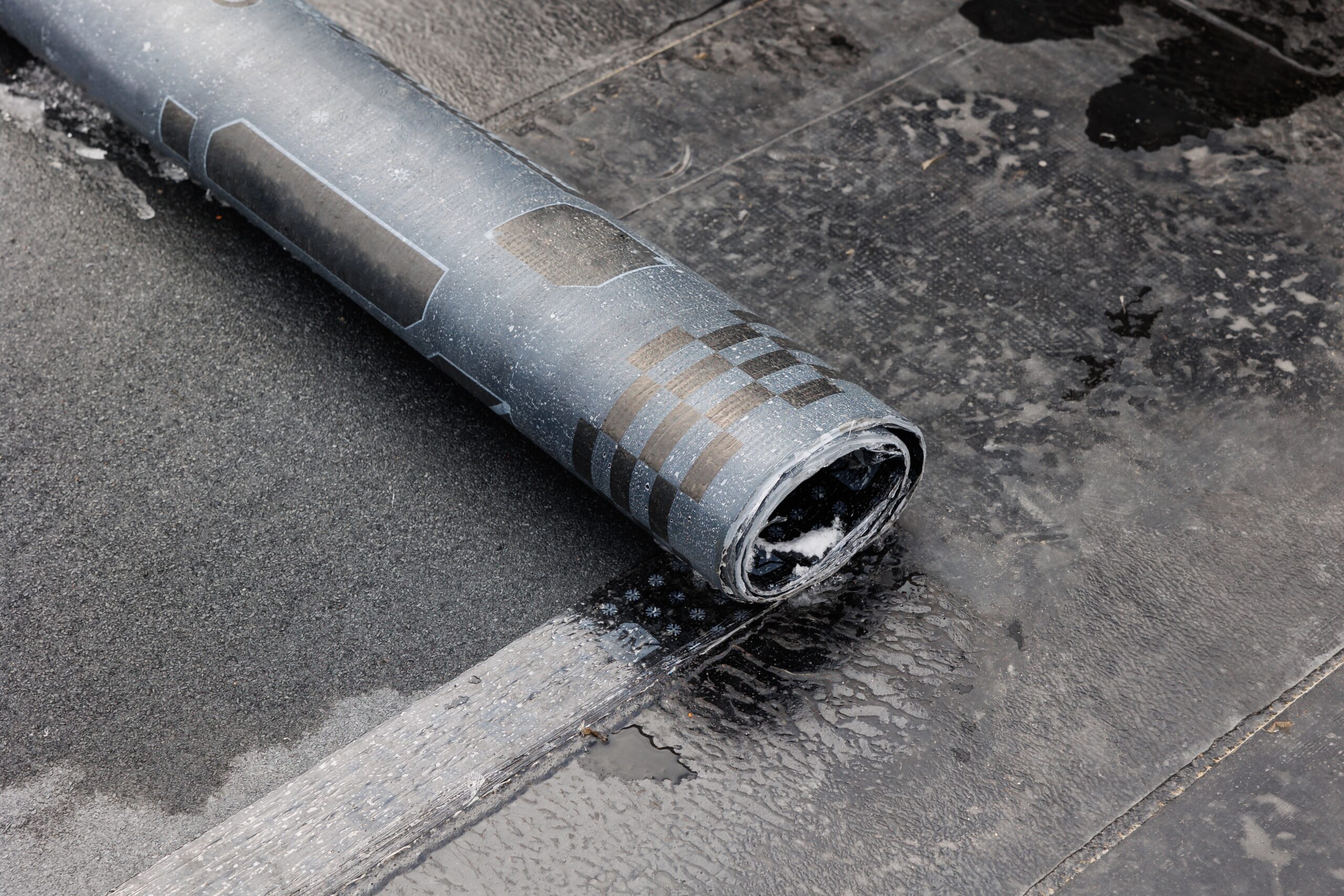 Flat,Roof,Installation,With,Propane,Blowtorch,During,Construction,Works,With